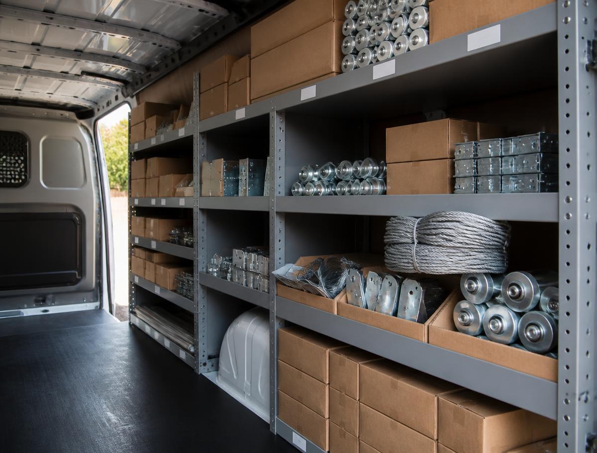 Stocked service van with garage door springs, rollers and hardware